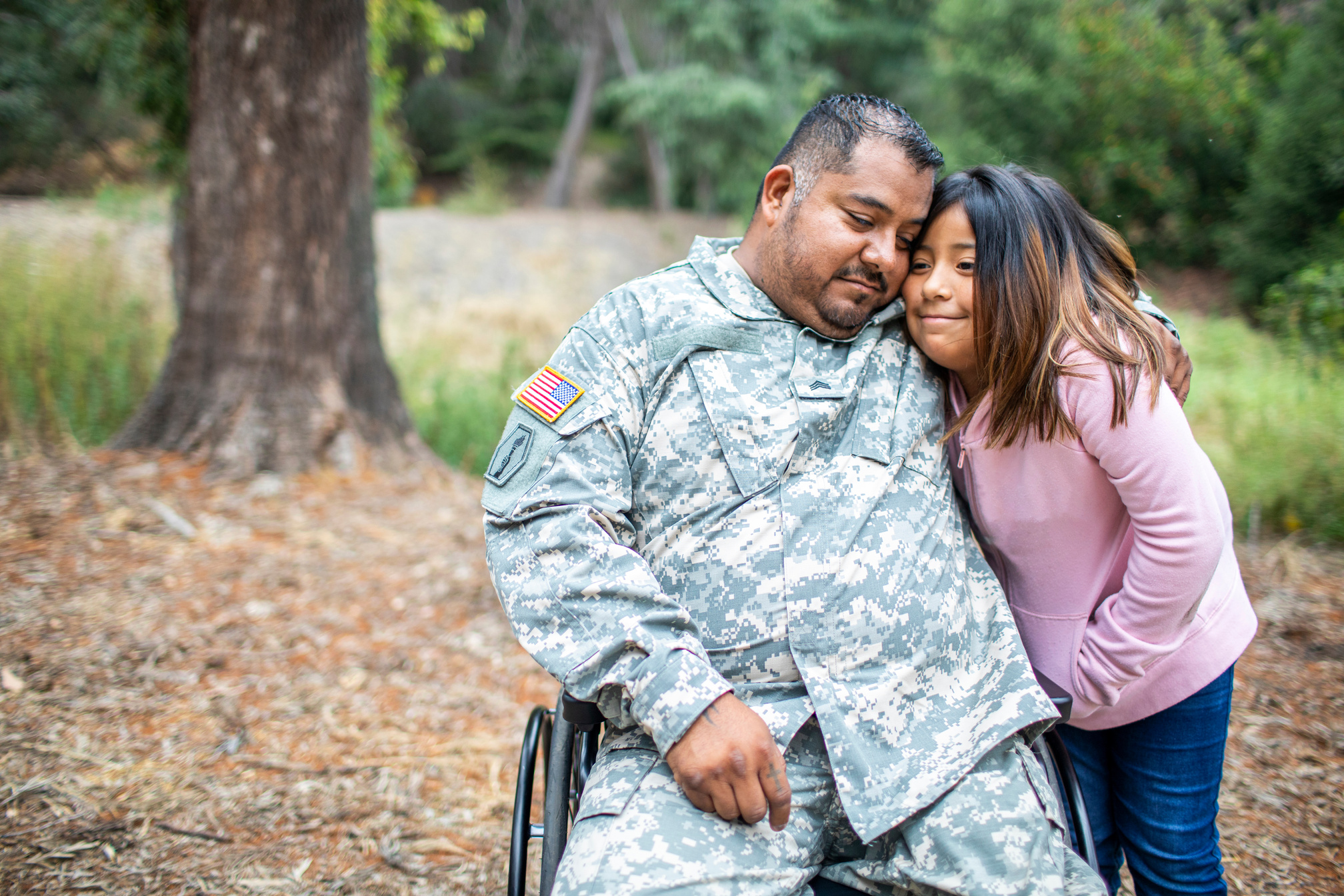 Veteran Embracing his Daughter